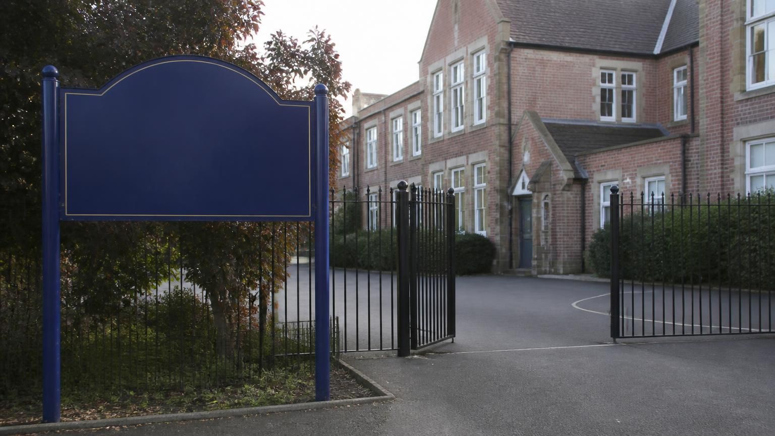 The entrance sign outside a Kent state school - Academy, community, voluntary aided, free school: what the labels actually mean for parents